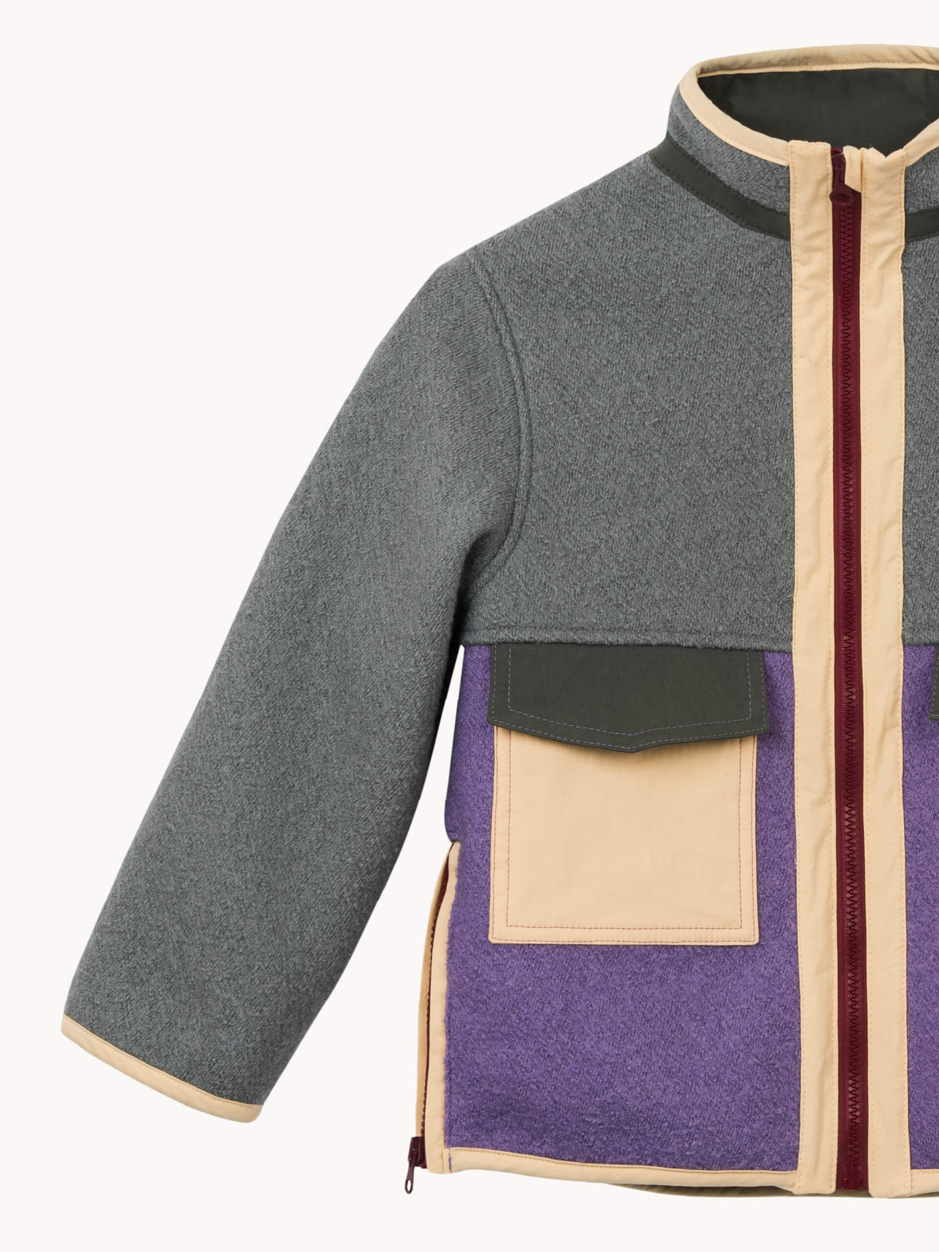 Gray and purple jacket with a zipper on a white background