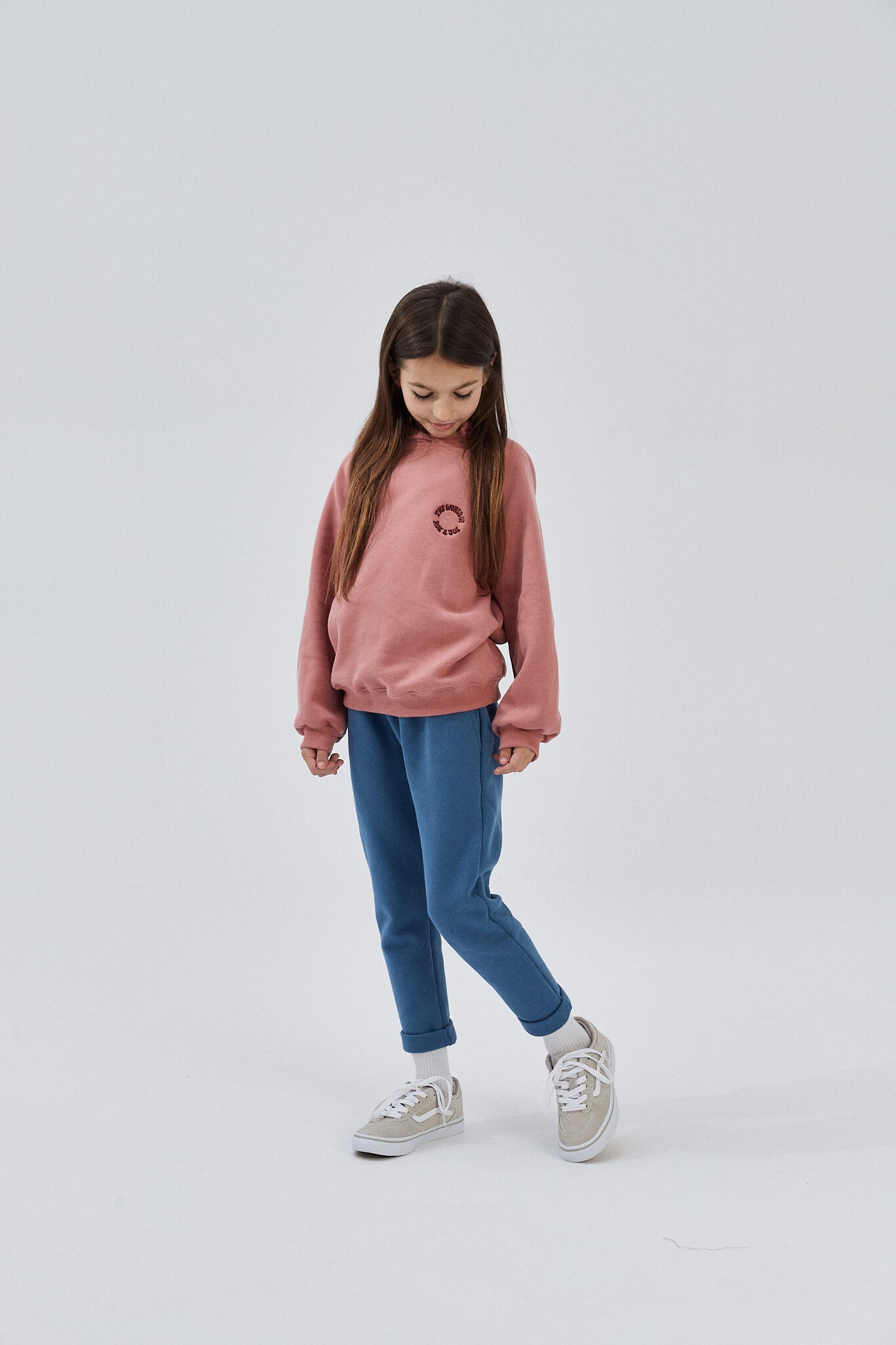 Child wearing organic cotton sweatpants in blue-gray color