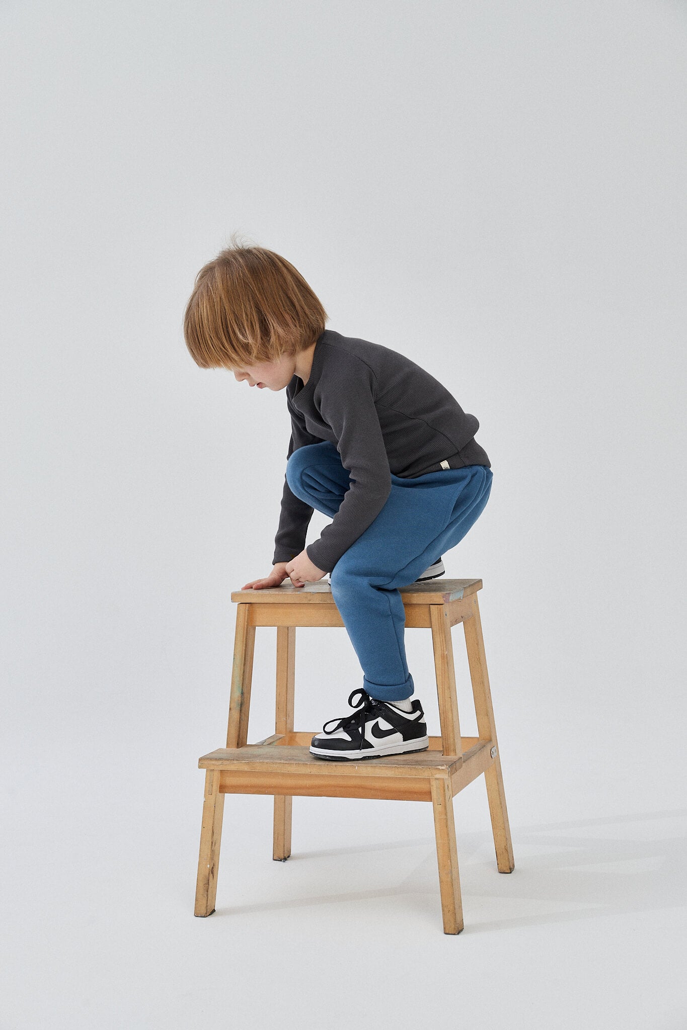 Boy in a longsleeve cotton grey