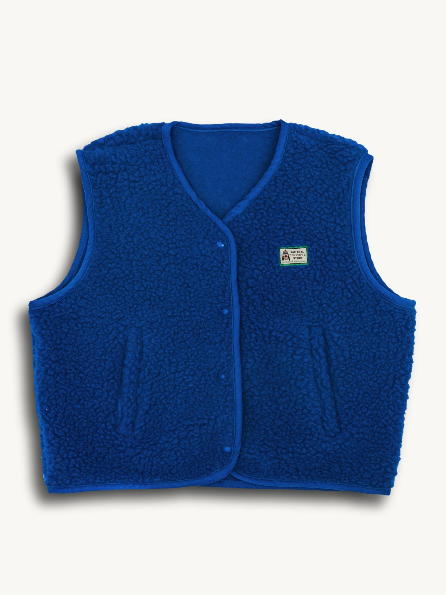 Blue merino wool vest on a white background