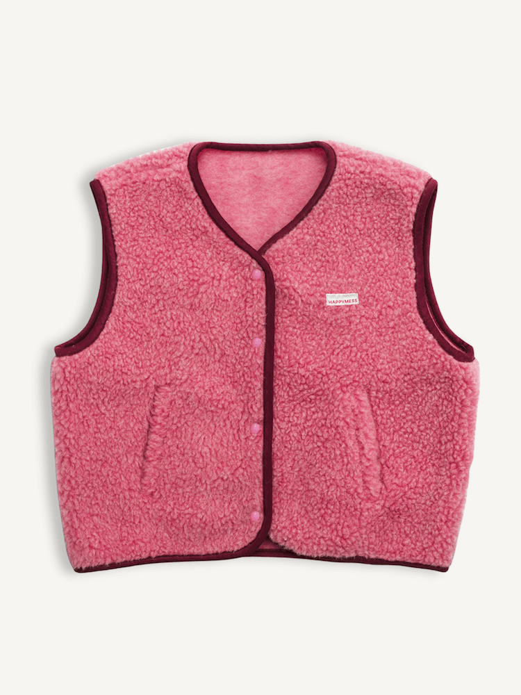 Pink fleece vest on a white background