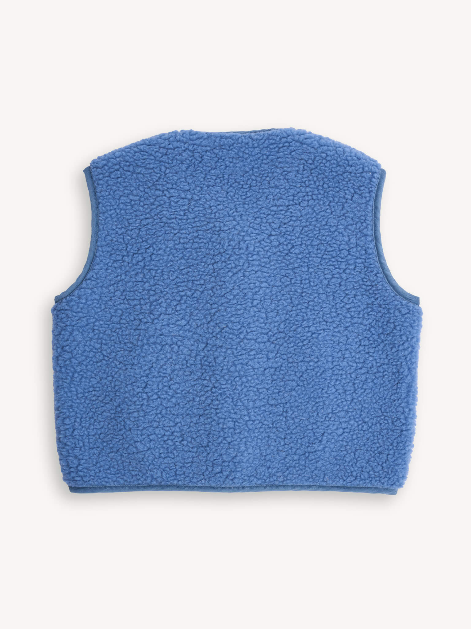 Blue fleece vest on a white background