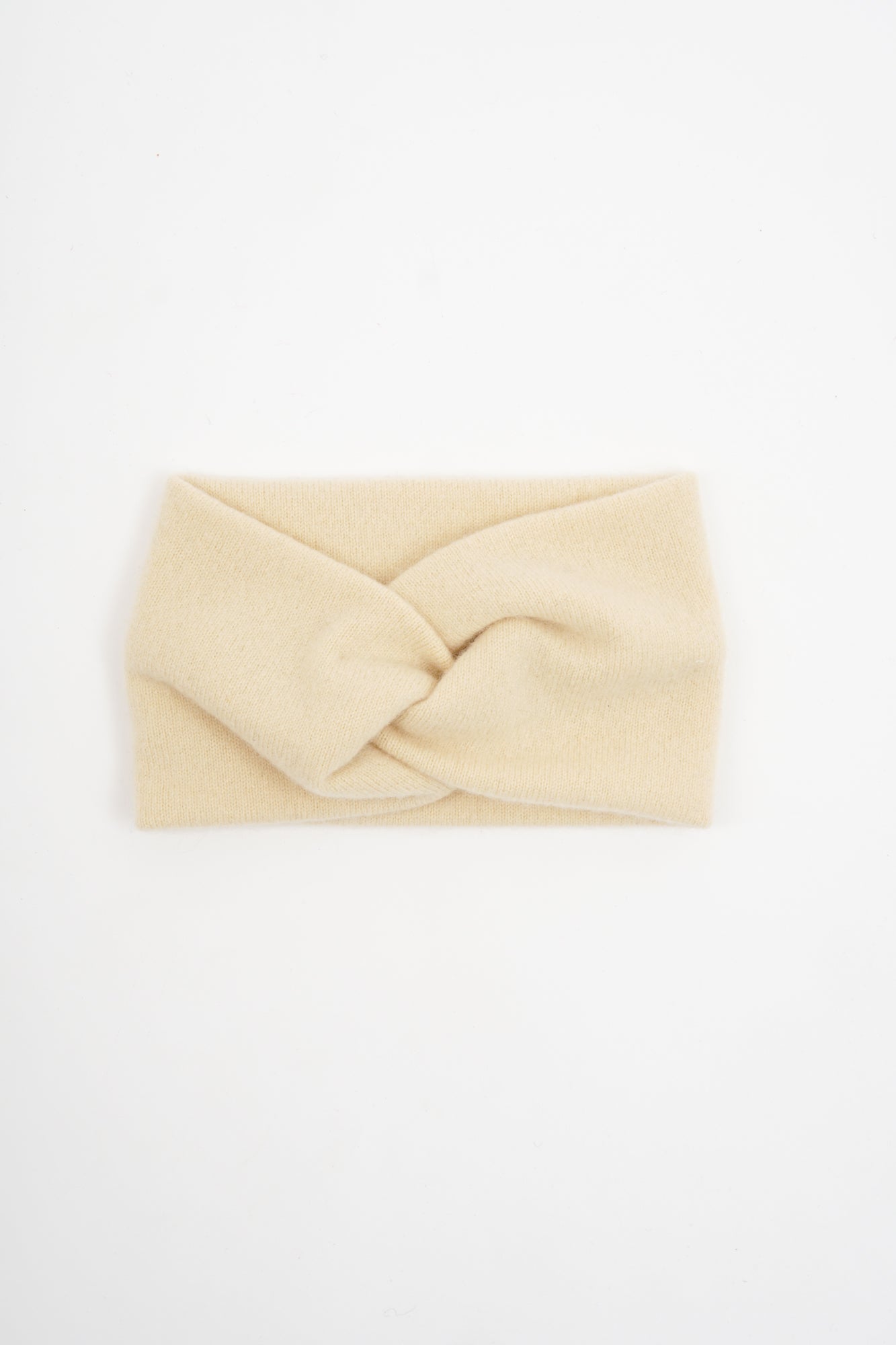 Beige headband with a knot