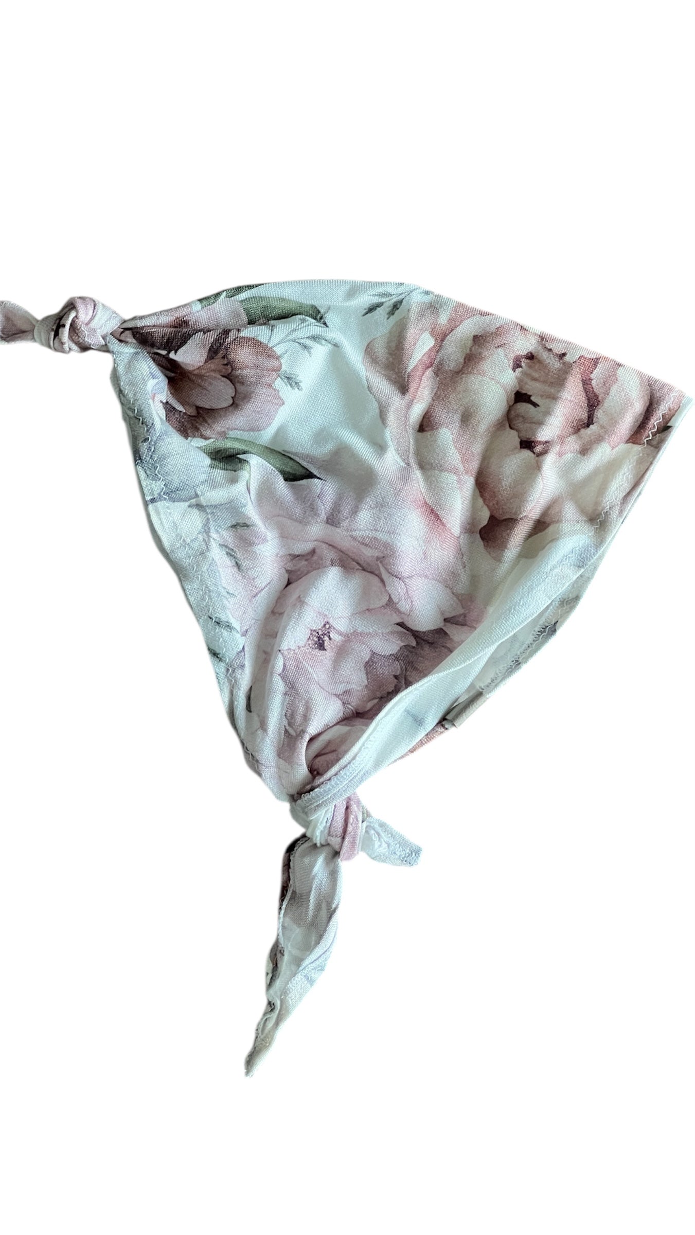 Lightweight pink and blue floral bamboo headscarf tied at the back