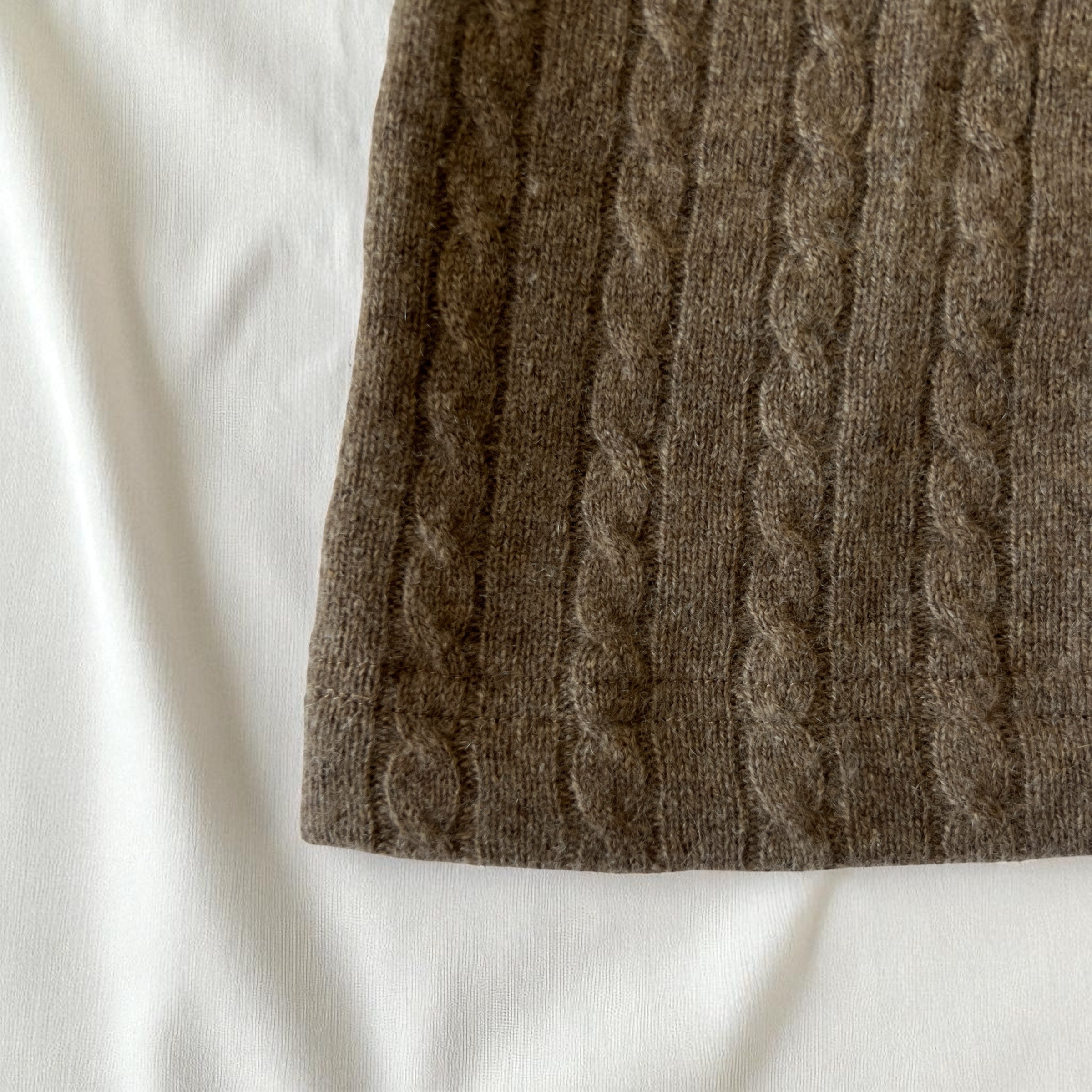 Close-up of a brown cable knit balaclava