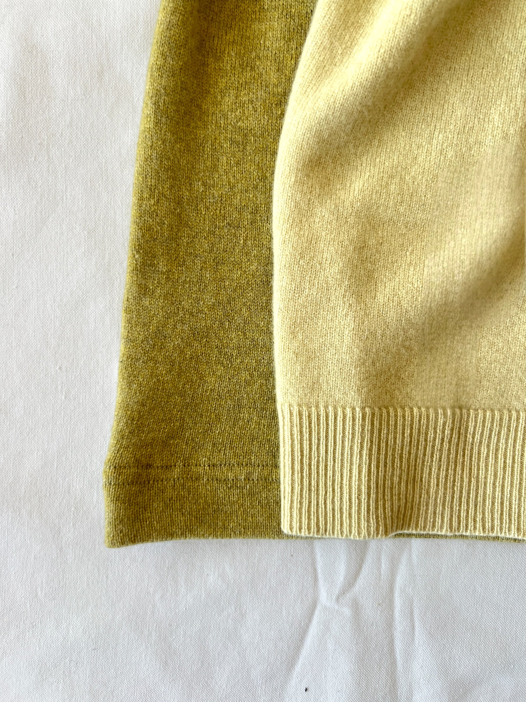 Close-up of a green pure cashmere balaclava