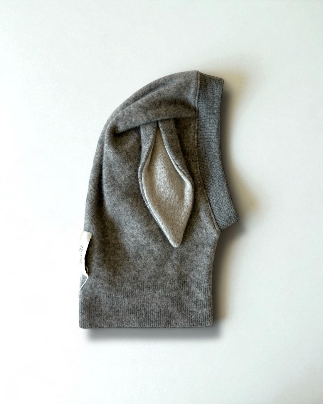 Gray baby hoodie with bunny ears on a white background