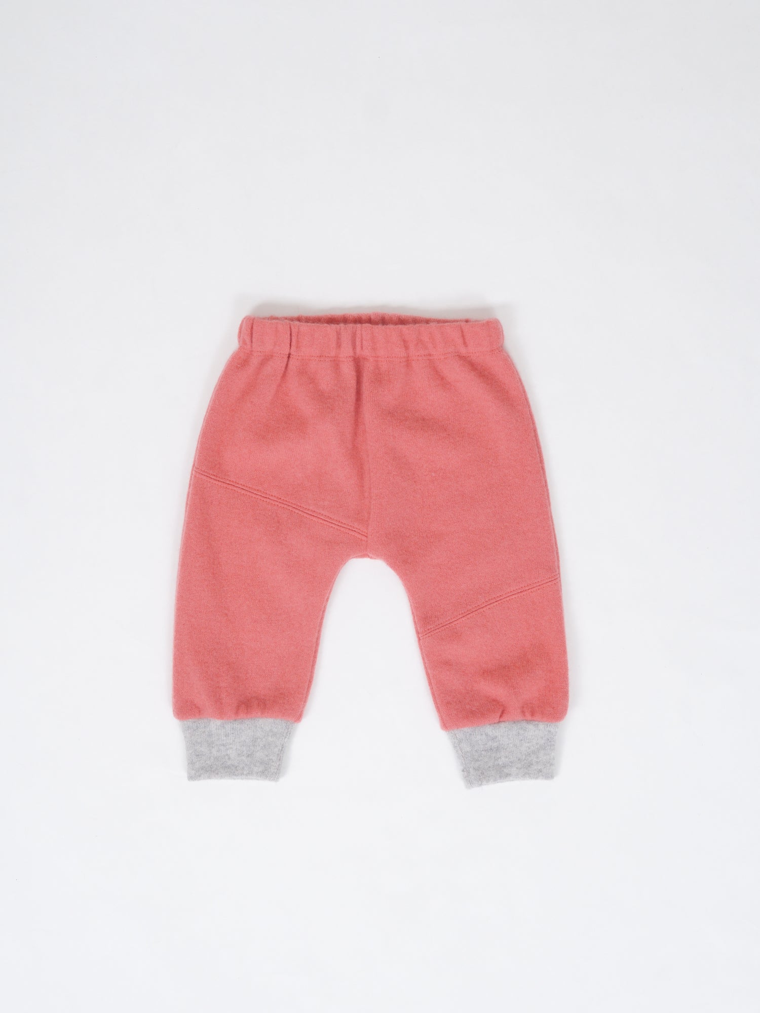 cashmere pants made of pure cashmere in color coral on a white background