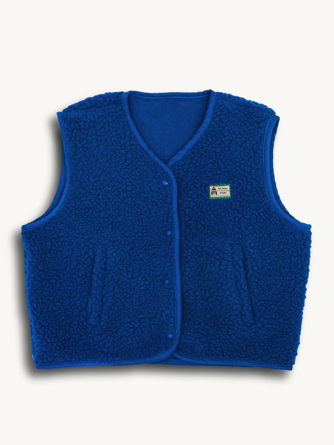 Blue merino wool vest on a white background