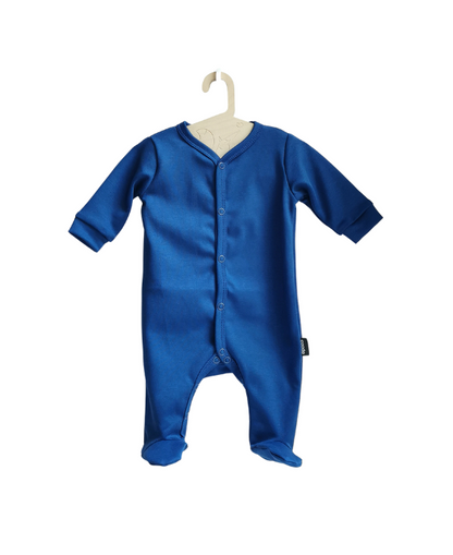 organic cotton and gots certified cobalt blue baby romper with feet on a white background 