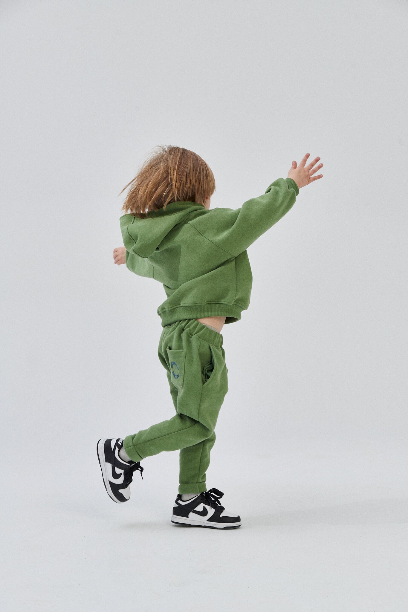 Green sweatpants girl