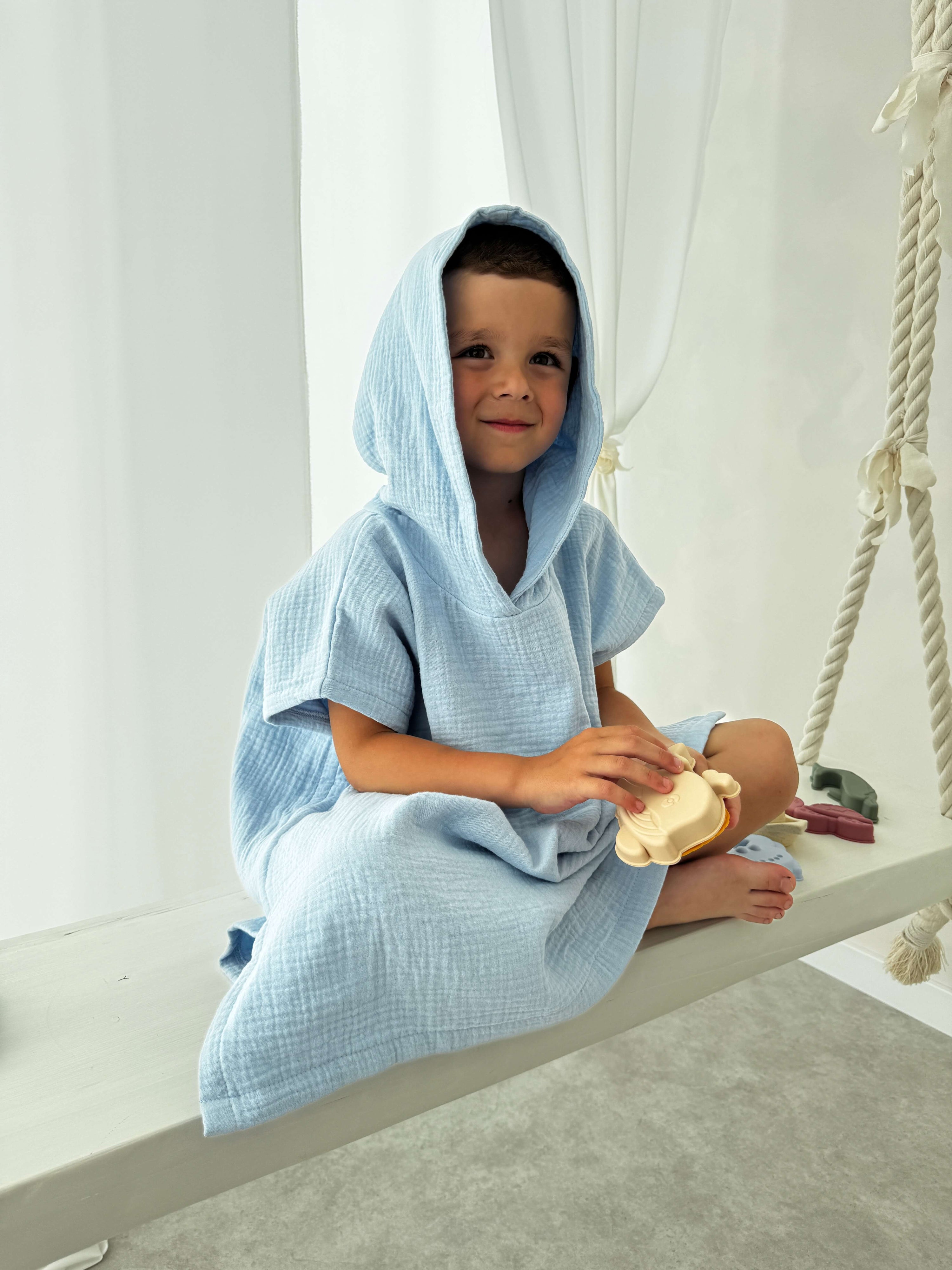 Organic muslin poncho light blue (size 1-3Y)