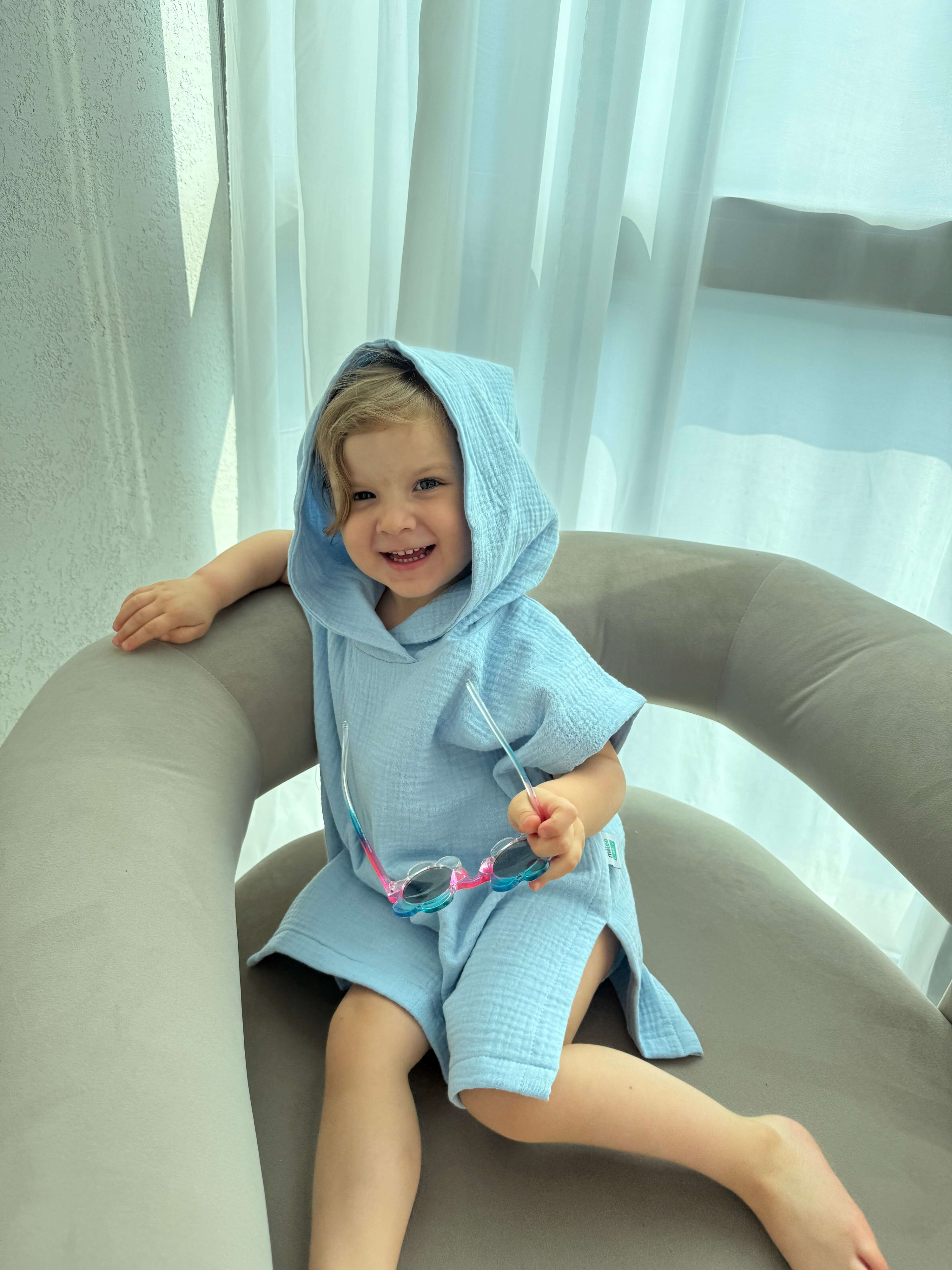 Organic muslin poncho light blue (size 1-3Y)