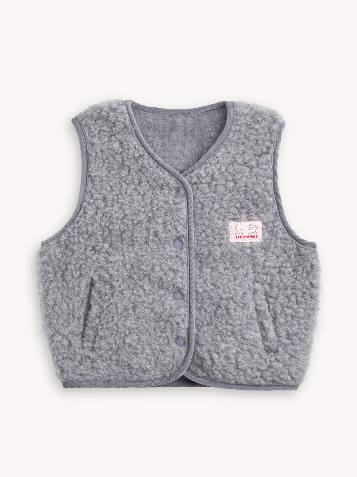 Gray merino wool vest with a brand label