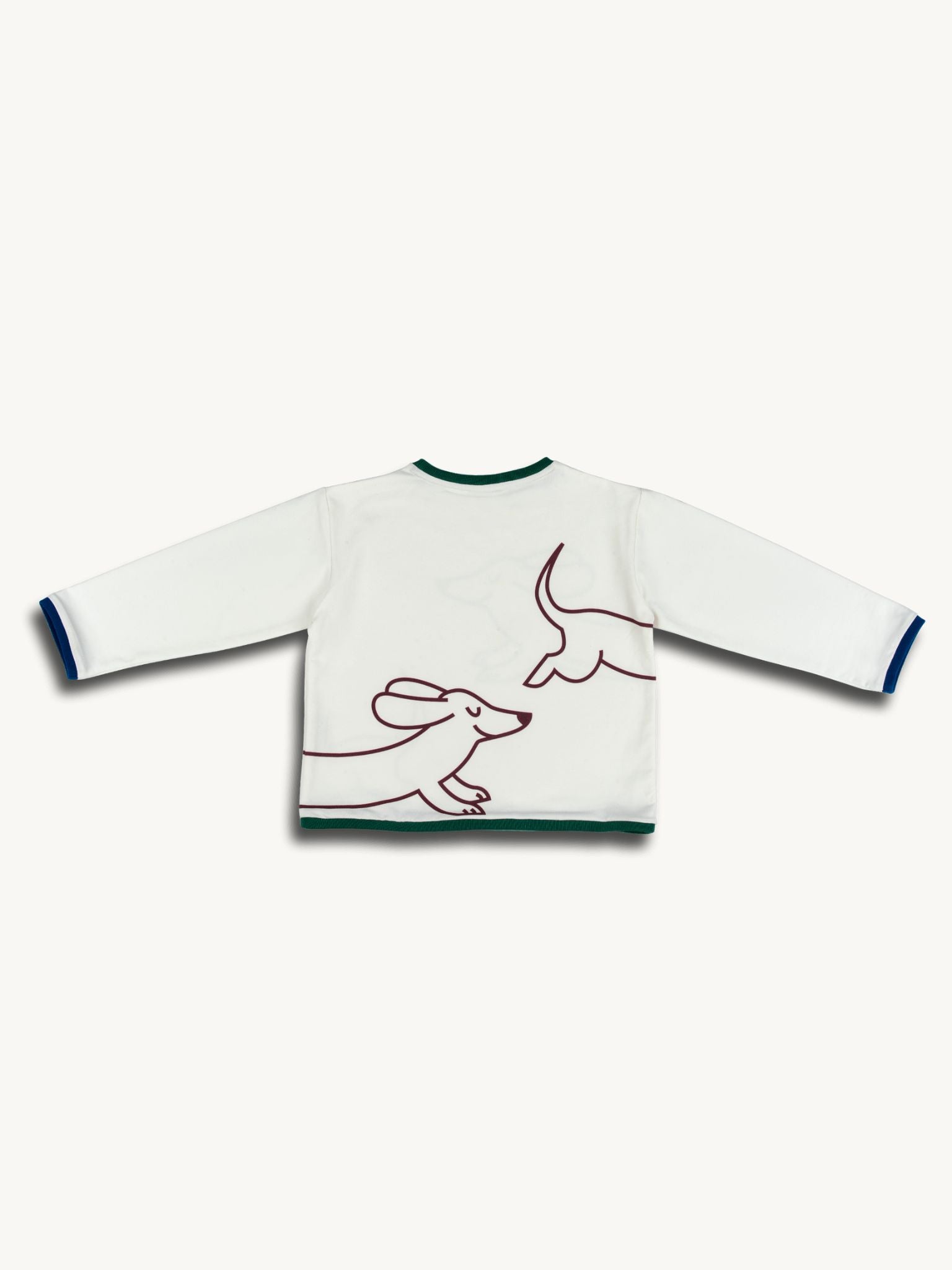 White sweater with line art of a dog