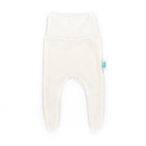 Ecru newborn pants with feet on a white background