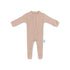 Robbed cotton beige baby romper with feet on a white background