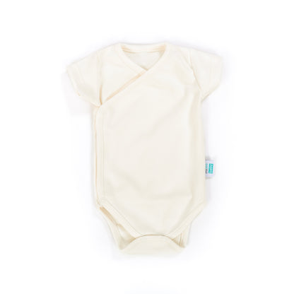 organic cotton short sleeve kimono bodysuit in color ecru on a white background