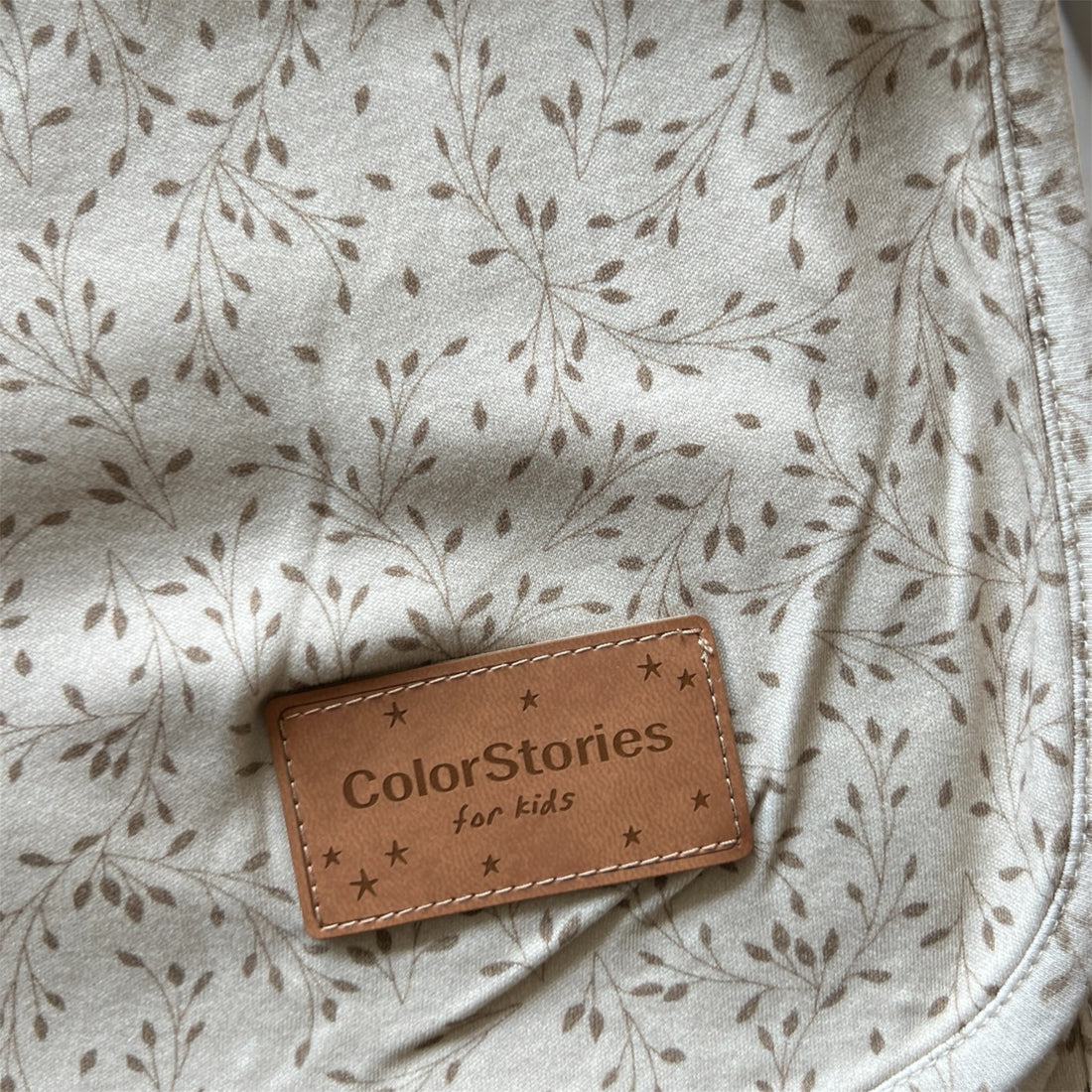Brown leather label with &
