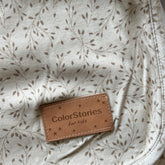 Brown leather label with &