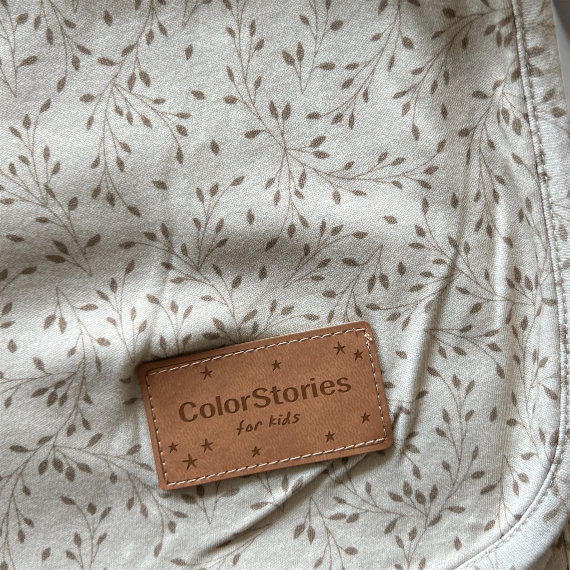 Brown leather label with &